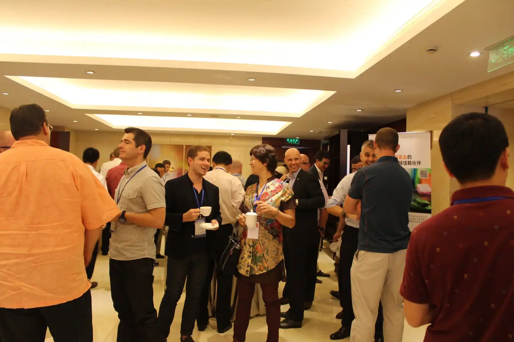 Attendees in conversation between sessions